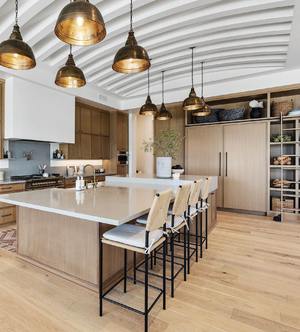 The stunning custom barrel beam ceiling treatment in the kitchen is one of a kind PHOTOGRAPHED BY DESERT LENSES PHOTOGRAPHY