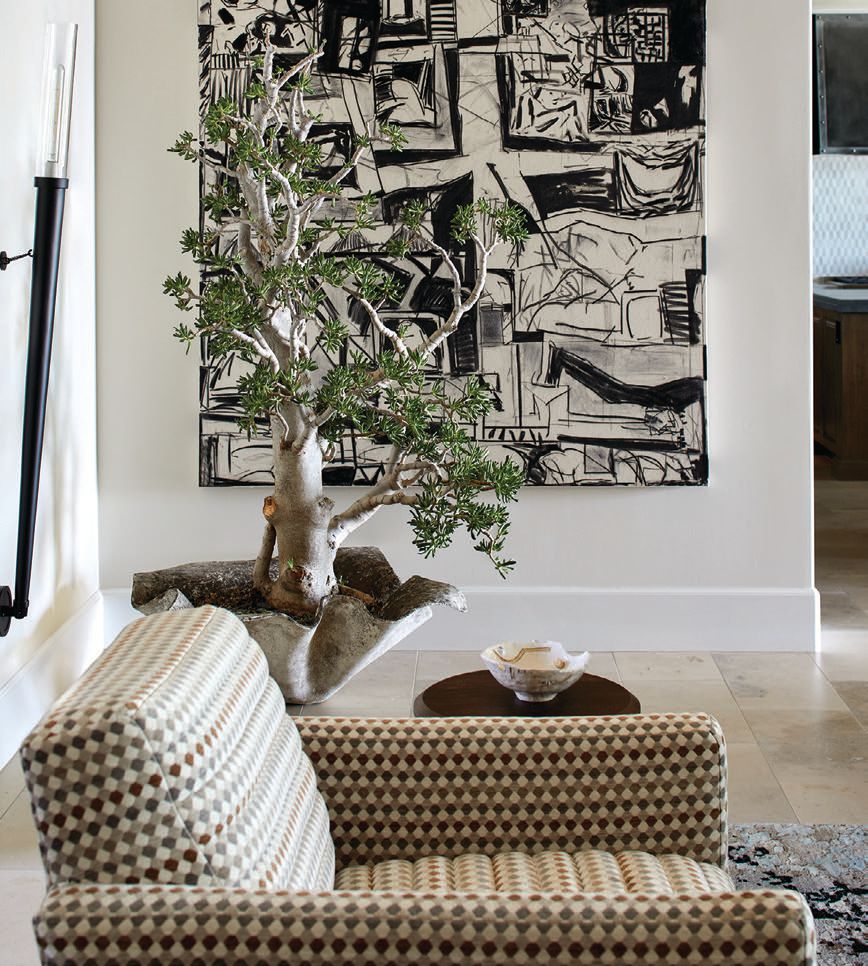 A bold black-and-white drawing by Jon Rollins adds contrast to the interiors PHOTOGRAPHED BY LAURA MOSS PHOTOGRAPHED BY LAURA MOSS