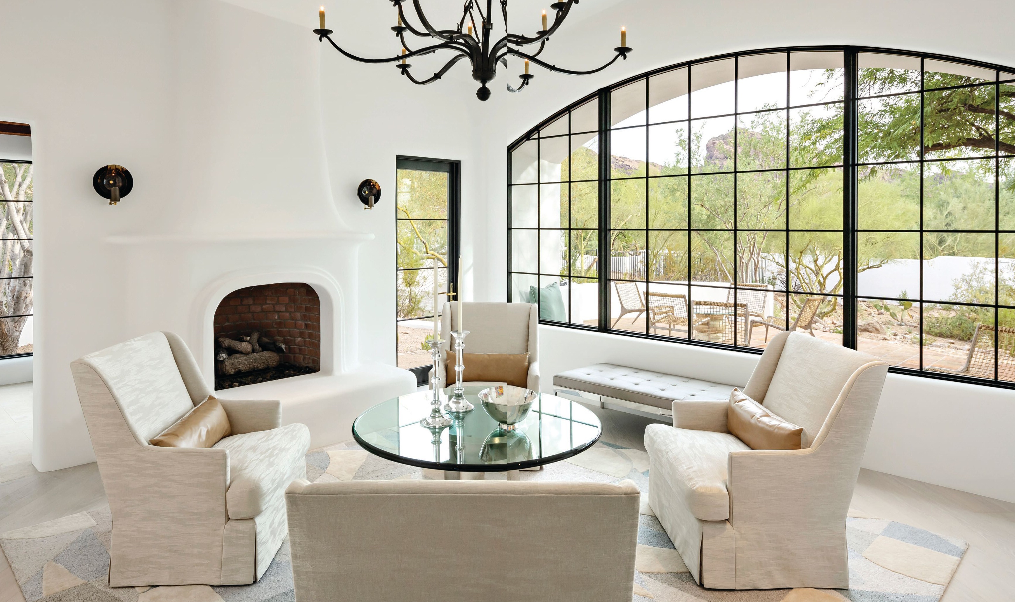 Designer Matthew Boland adjusted the plaster on the fireplace of this Paradise Valley home three times before finding the perfect final sculptural shape. Photographed by Joe Cotitta