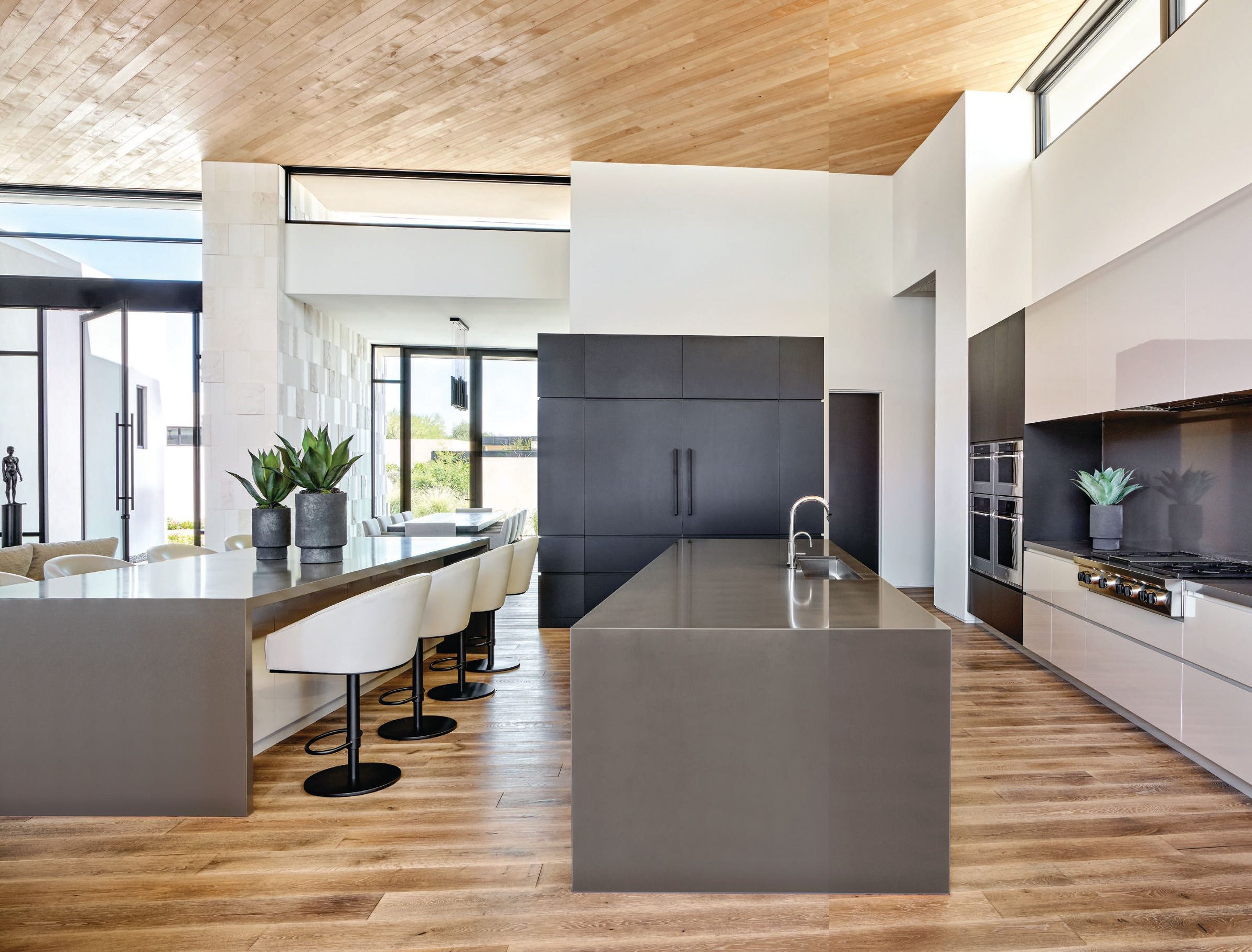 Ownby kept function top of mind for this minimalist kitchen, which features cabinets from Distinctive Custom Cabinetry, appliances from Sub-Zero and Wolf, and Duchateau Riverstone flooring PHOTOGRAPHED BY WERNER SEGARRA