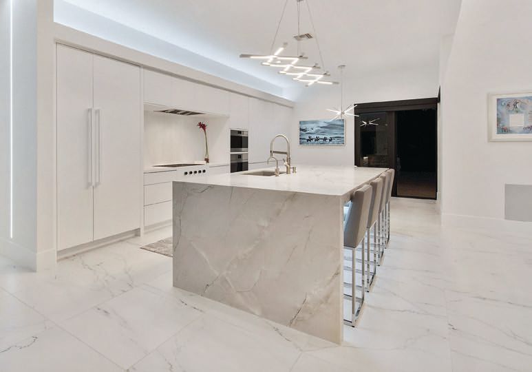 Lighting from Modern Forms brings the kitchen to life at night. PHOTO COURTESY OF RMB LUXURY REAL ESTATE